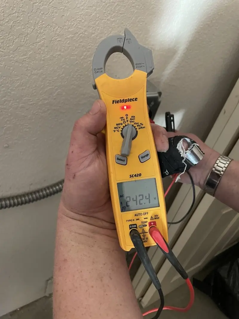 Voltage testing with clamp meter during Generator Installation in Deep River